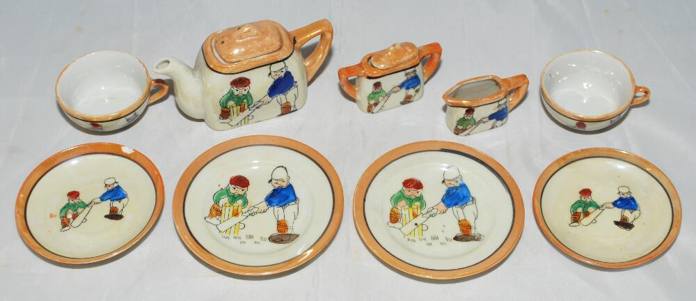 Japanese tea set each featuring a batsman and wicketkeeper at the crease. The set comprises two cups
