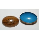 Rugby Ball. Attractive small orange/brown metal sweet tin box in the shape of a rugby ball, with