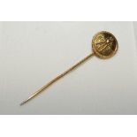 Cricket lapel/tie pin. Attractive gold pin with circular head depicting a batsman in batting pose in
