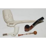 Football pipe. Large early 20th century clay pipe with football boot and football foot. With