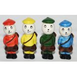 Golf figures. Four Carlton Ware 'Dunlop style' golfing figures. Various coloured hand painted glazed