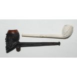 W.G. Grace smoking pipe 1895. Vulcanite cricket pipe with cricket bat shaped stem and 'Grace head'