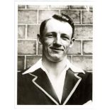 Don Bradman. Original mono press photograph of a youthful Bradman, head and shoulders, wearing