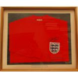 England World Cup Winners 1966. Red England replica shirt with emblem of three lions to chest.