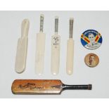 Miniature cricket bats. 'Rowntree's Cachous' miniature metal advertising cricket bat. 4.5". Some