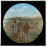 W.G. Grace. c.1880s. Victorian glass lantern slide showing a painted image of a cricket match