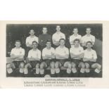 Tottenham Hotspur 1958/59. Mono real photograph postcard of the team, standing and seated in rows on