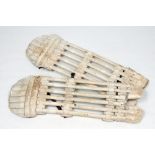 'Skeleton Leg Guards'. Pair of very early original circa 1880 open ribbed wicker and cane batting