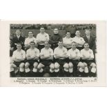 Tottenham Hotspur 1953/54. Mono real photograph postcard of the team, standing and seated in rows on
