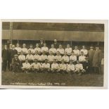 Tottenham Hotspur 1909/10. Early mono real photograph postcard of the team and officials, standing