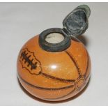 Football inkwell. A Victorian glazed transfer-printed stoneware inkwell, shaped as a slightly