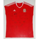 Wales. Replica red Wales International shirt signed to shirt by twenty one players. The shirt