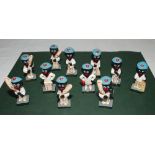 Robertson golliwog cricketers. Eleven different figures including nine batsmen, one bowler and a