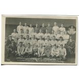 Tottenham Hotspur 1919/20. Mono real photograph postcard of the team and officials standing and