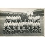 Tottenham Hotspur 1955/56. Mono real photograph postcard of the team, standing and seated in rows on