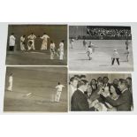 Australia 1953-1956. Four original mono press photographs including Gil Langley inspecting his split
