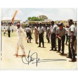 Brian Lara 1994. Colour press photograph of Lara raising his bat to the crowd having broken Garry