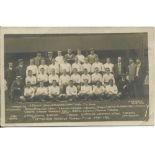 Tottenham Hotspur 1910/11. Early mono real photograph postcard of the team and officials, standing
