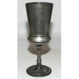 Victorian pewter goblet, with tapering sides, a narrow stem and on a circular foot. Engraved with