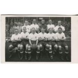 Tottenham Hotspur 1938/39. Mono real photograph postcard of the team, standing and seated in rows on