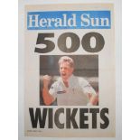 Shane Warne Test wicket milestones. Two original colour newspaper posters celebrating significant