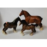 A Beswick shirehorse Ch. Burnham Beauty, matt finish, h.27cm; together with two Beswick shirehorses,