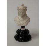 A carved marble female head and shoulders bust on a socle base, height 35cm