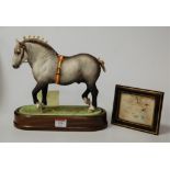 A Royal Worcester model of a Percheron stallion, modelled by Doris Lindner, on wooden stand, No.