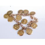 A 9ct gold curblink bracelet containing a quantity of 9ct gold charms, each depicting signs of the