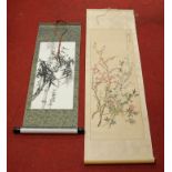 A Japanese watercolour scroll of flowering bamboo, boxed, together with one other Japanese scroll (