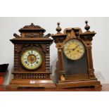 A circa 1900 American oak cased mantel clock, having Ansonia spring-driven movement; and one