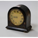 A Japan black lacquered case dome-top mantel clock, h.14cm