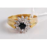 An 18ct gold, blue and white sapphire set flower head cluster ring, 4.8g, size M