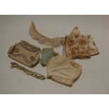 A collection of miscellaneous items, to include lady's beadwork purse, various lace and linen etc