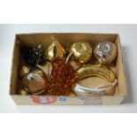 A collection of silver plated and polished brass table ornaments, in the form of fruit; together