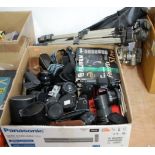 A large collection of mid to late 20th century cameras and photography equipment