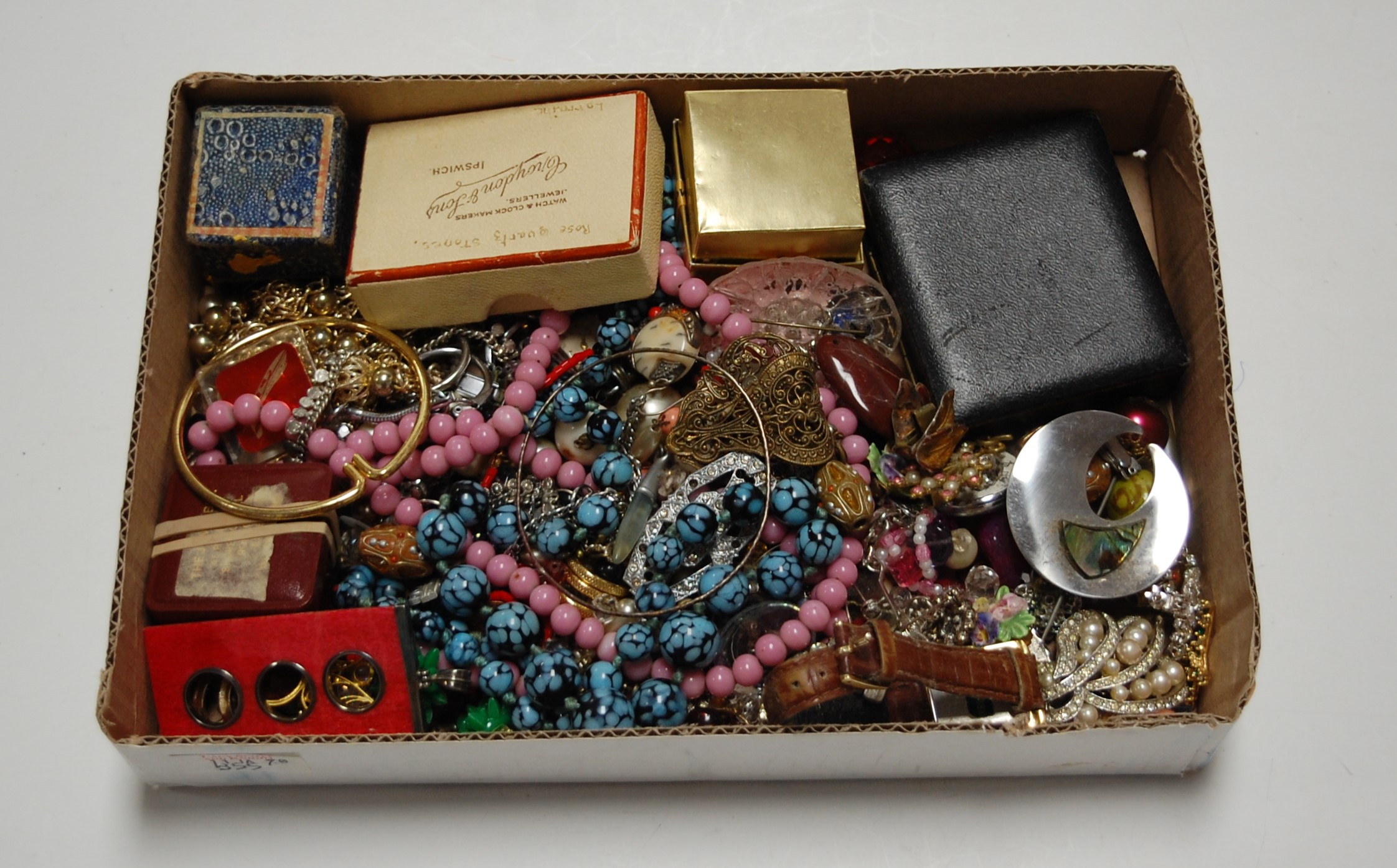 A small collection of assorted costume jewellery, to include bangles, beaded necklaces, loose