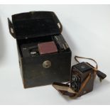 An Ensign Reflex Model B medium format camera with plates, in case together with a Rolleicord box
