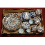 A collection of principally Chinese Imari stonewares, to include plates, saucers, miniature