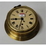An F.W. Elliott Ltd of Croydon brass cased ships clock, 21cm