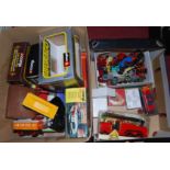 Two boxes containing a quantity of mixed diecast, tinplate and Hornby railway items, to include