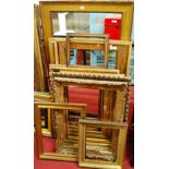 A collection of principally gilt gesso picture frames, late 19th century and later, various sizes