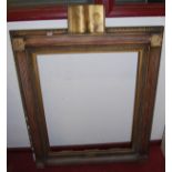 A large 19th century giltwood rectangular picture frame, having egg & dart moulded outer border,