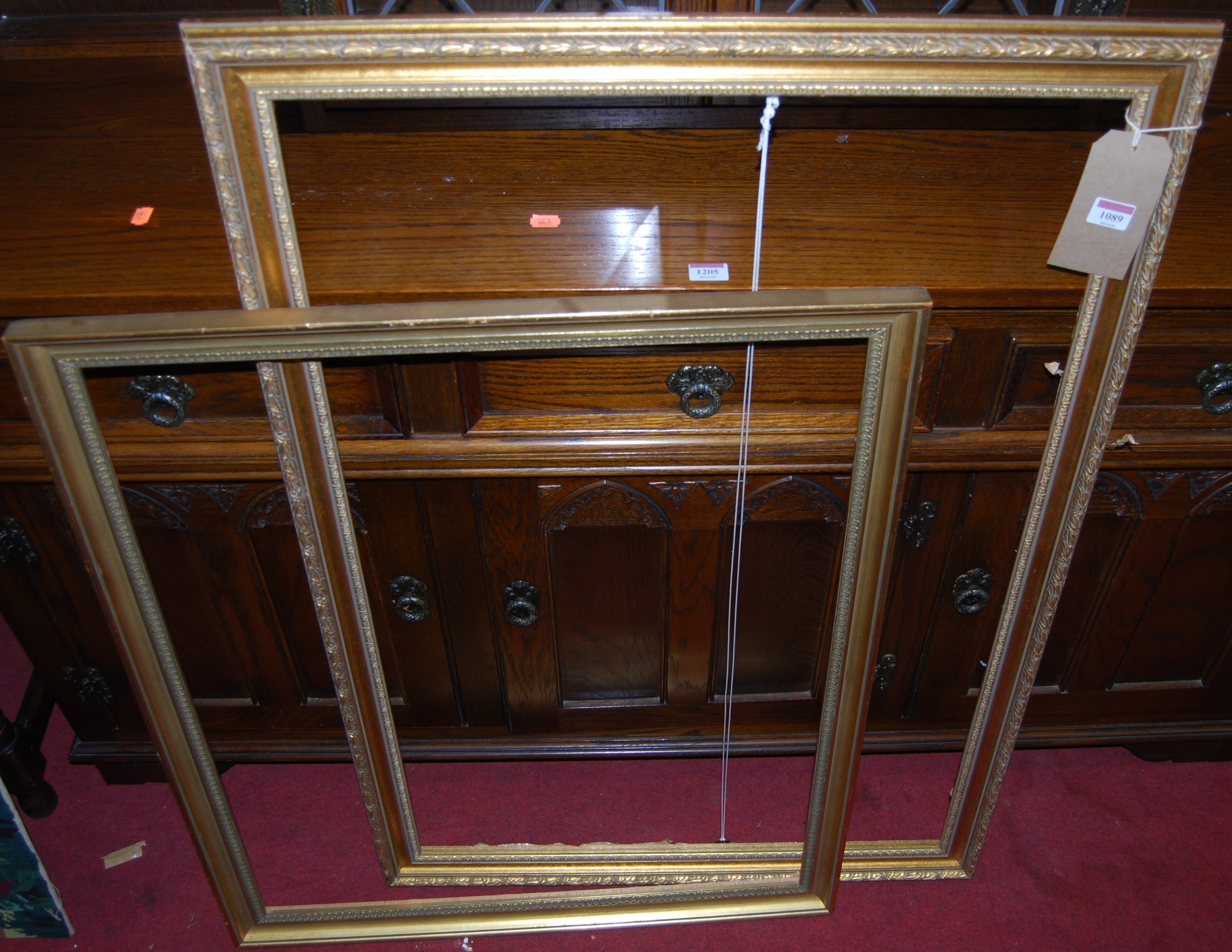 A 19th century gilt composition picture frame; and two modern examples (3)