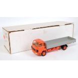 A white metal and resin kit built model of a Saurer 4-wheel flatbed lorry comprising orange