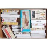 One tray containing 26 various plastic mixed scale aircraft kits to include Airfix, Matchbox,