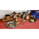 A large lot of various mixed metal ware to include Victorian measuring jugs, a pewter salver, a