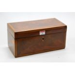 A George III mahogany and satinwood banded tea caddy, of plain rectangular form, the hinged lid