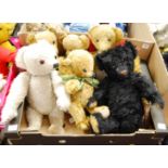 Two boxes of assorted children's soft toys to include a Merrythought black mohair bear, a Herman