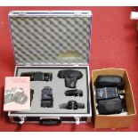 A Pentax ME series camera, in fitted case with various lenses and accessories; together with various